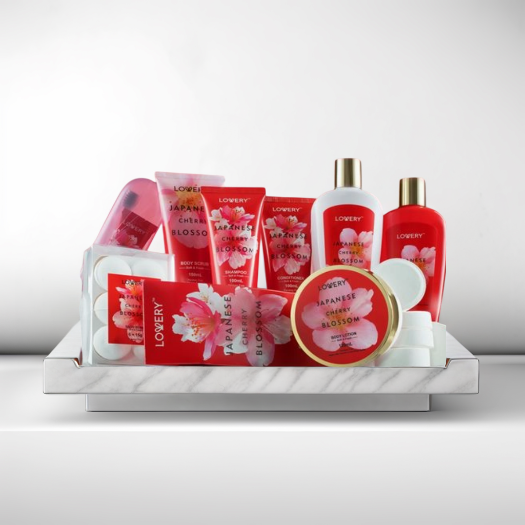 Set of Lowery skincare products with cherry blossom design on a white surface