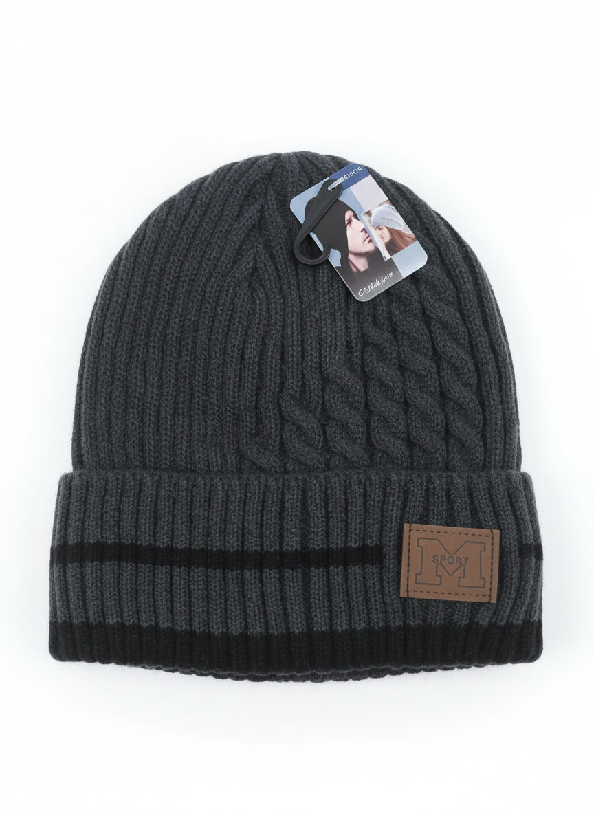 Dark Grey knit beanie with a brand tag on a white background
