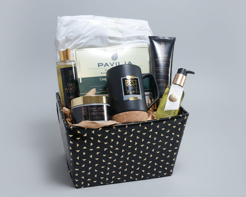 Collection of beauty products including a bottle, a box labeled 'Pavilia', and a patterned bag on a wooden surface.