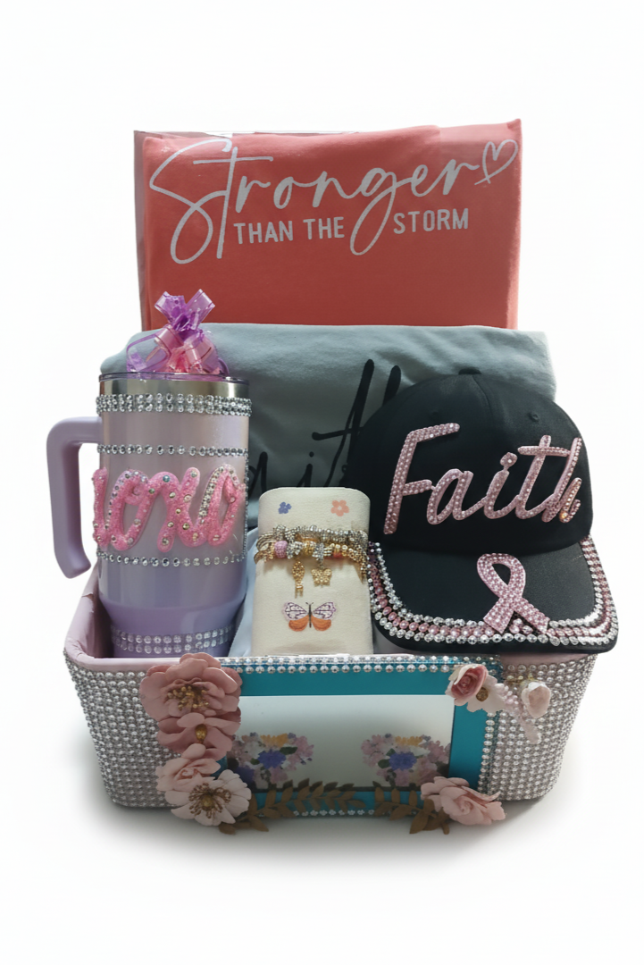 Gift basket with mug, cap, and other items on a white background