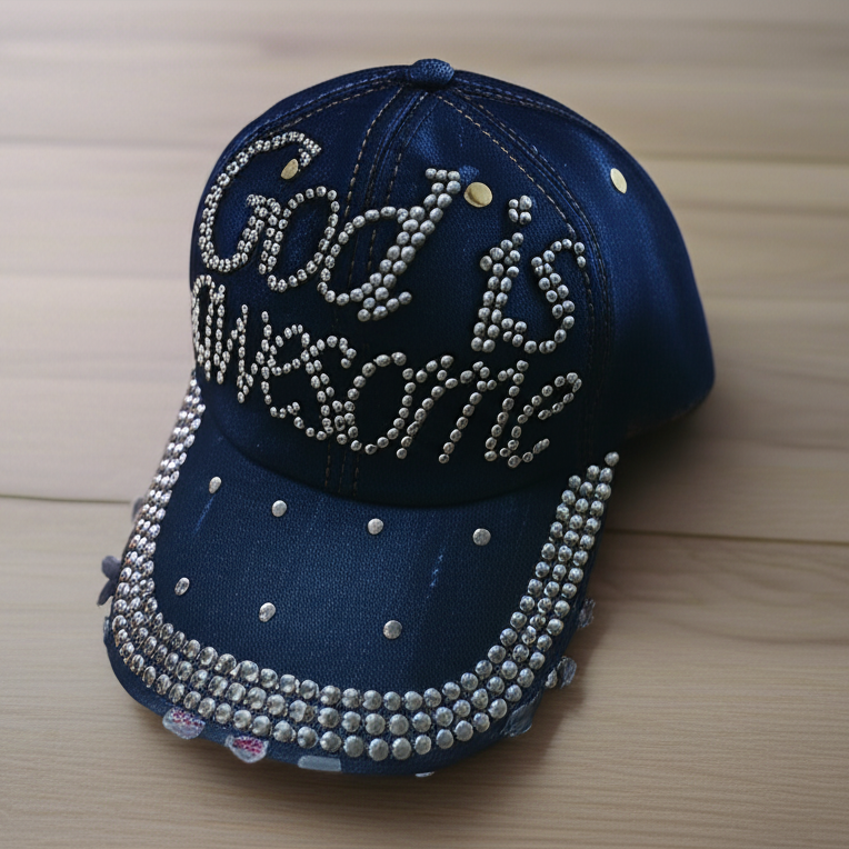 Blue cap with rhinestone embellishments on a wooden surface