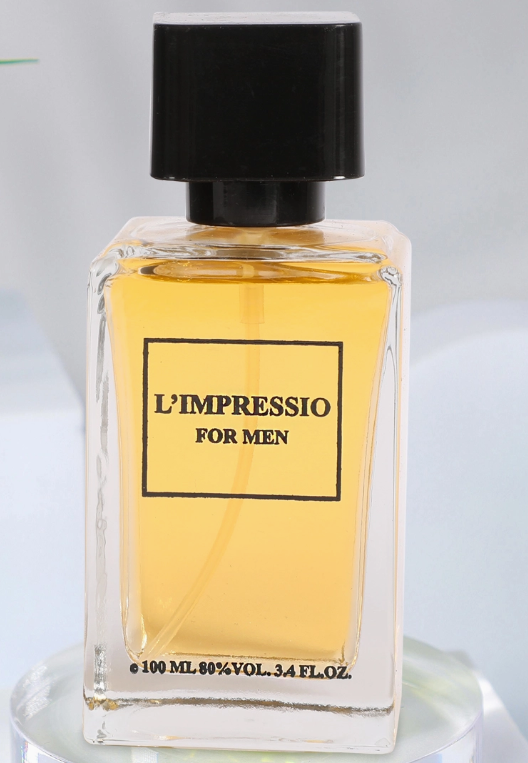Perfume bottle labeled 'L'Impressio for Men' on a light gray background