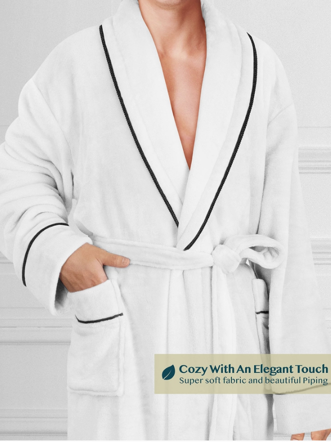 White robe with black piping on a neutral background