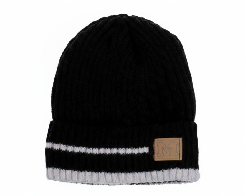 Black knit beanie with white stripe and brand patch on a white background