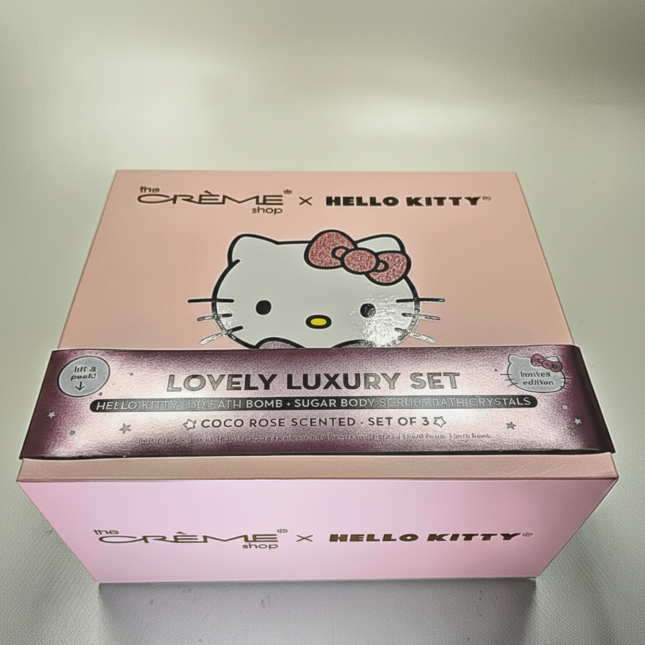 Pink packaging box with Hello Kitty design featuring 'The Crème Shop' branding.