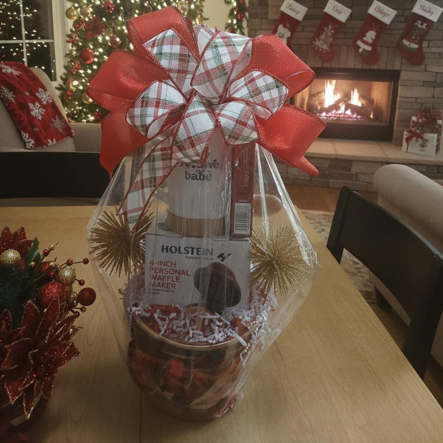 Gift bag with a Holstein brand product on a table in a festive living room.
