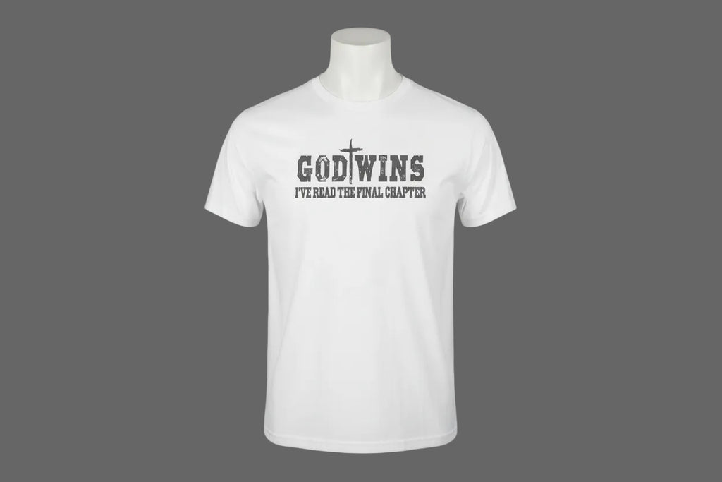 Gray t-shirt with text on a wooden surface