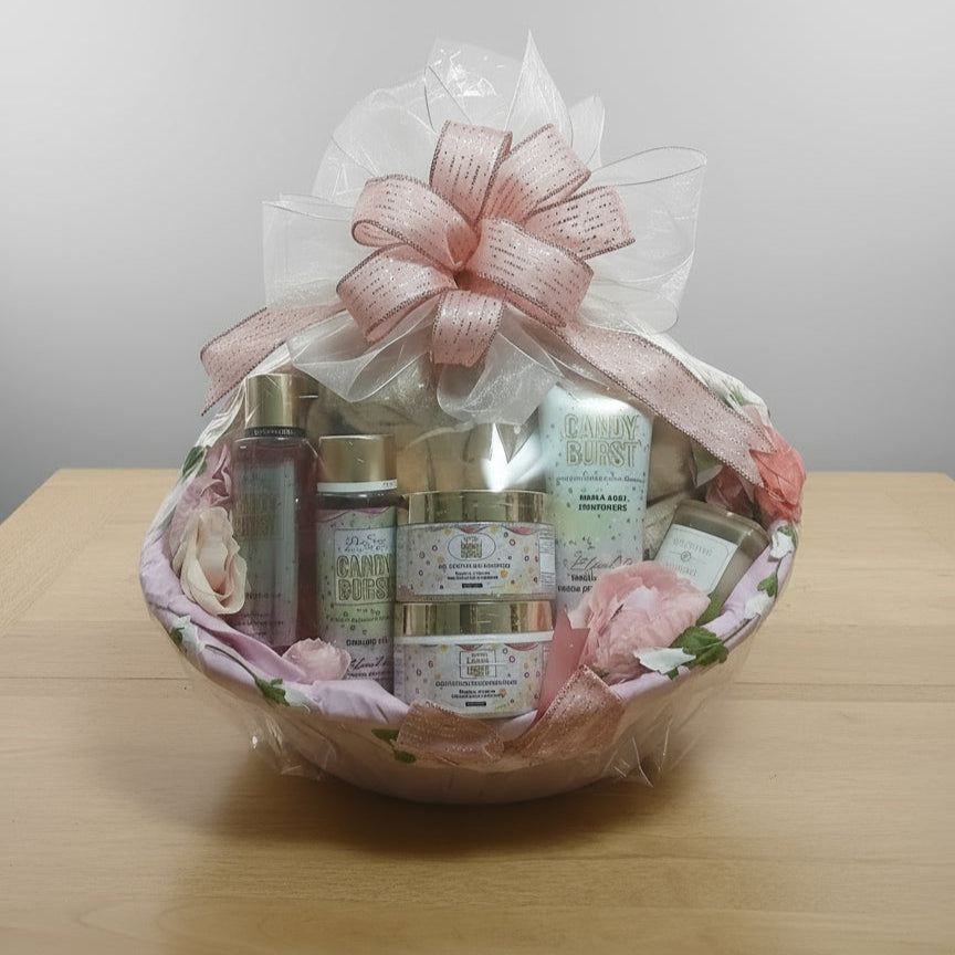 Bouquet of skincare products in a decorative basket with a pink bow on a wooden surface.