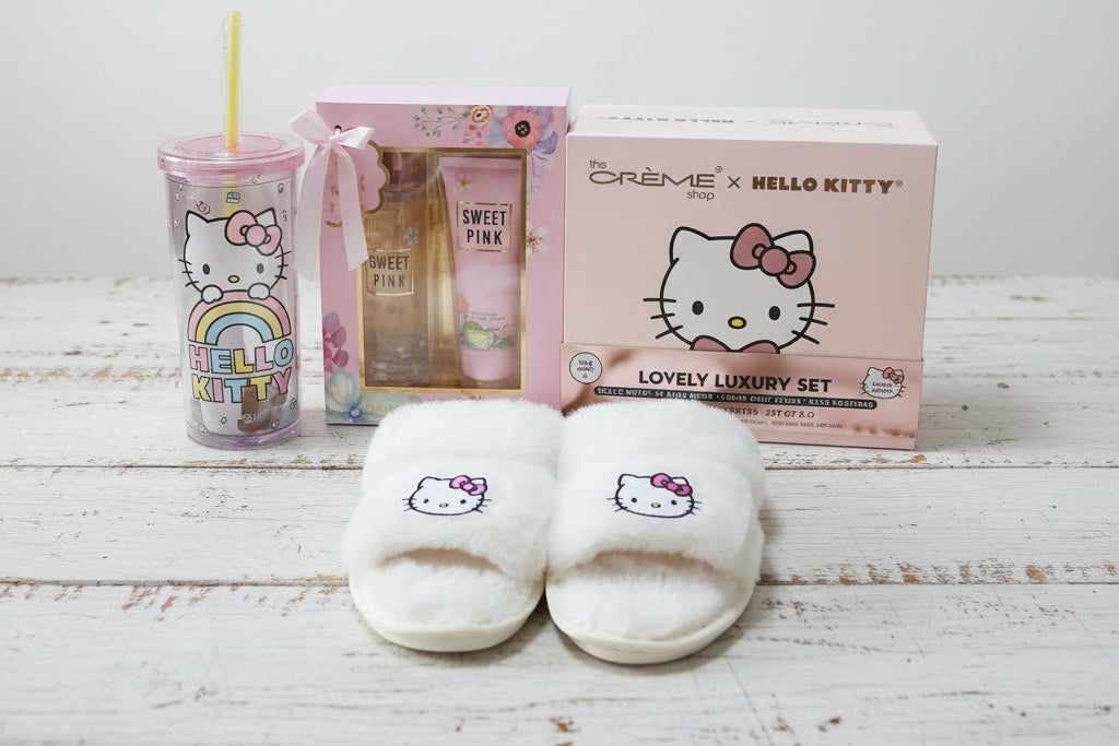 Hello Kitty-themed products including slippers, tumbler, and bath set on a wooden surface.