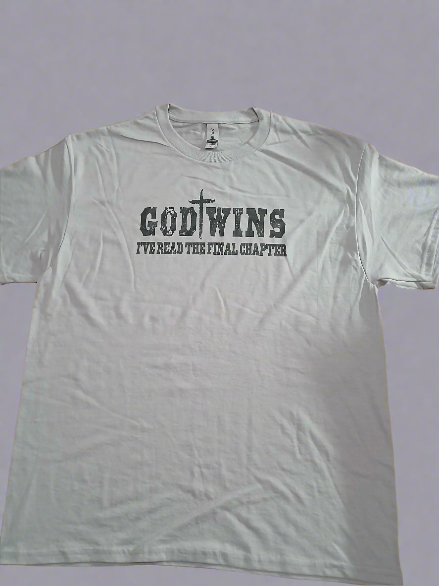 Gray t-shirt with text on a wooden surface