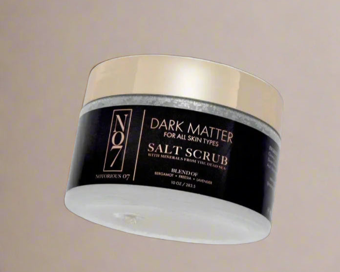 Jar of Dark Matter Salt Scrub on a white background